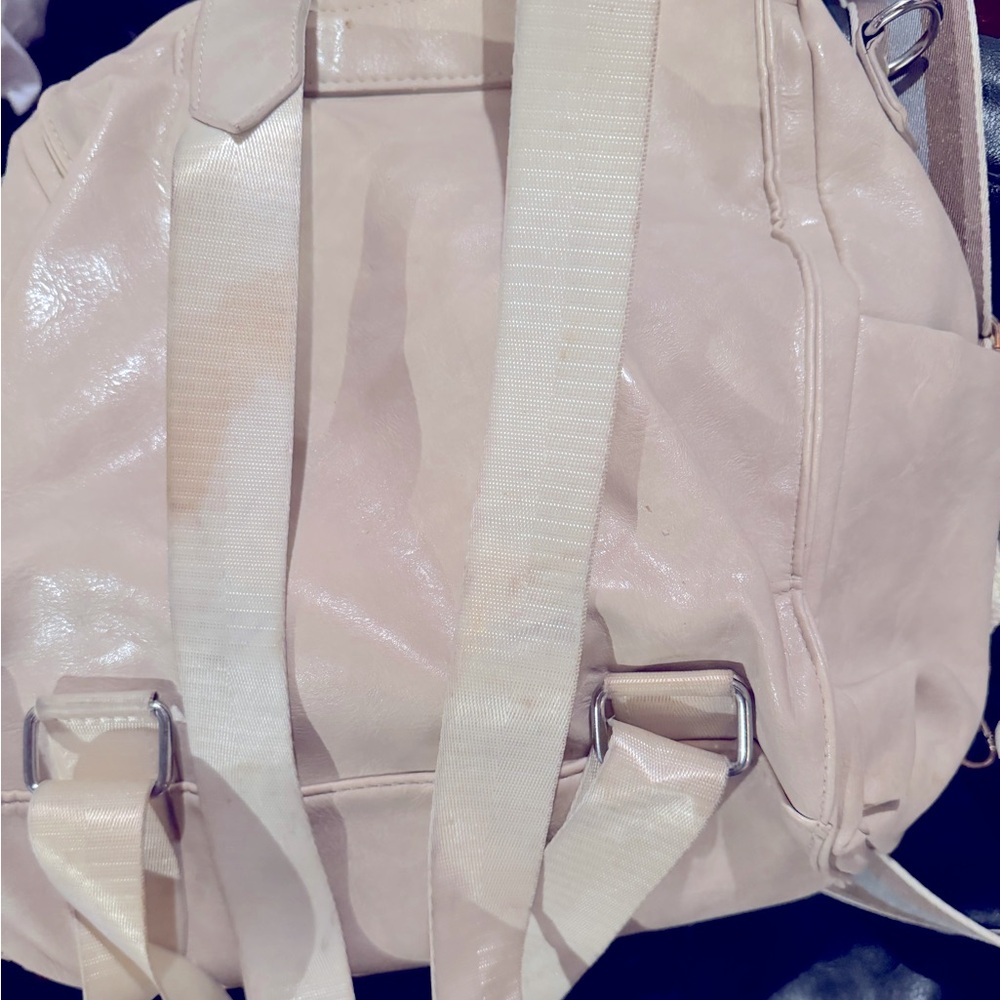 Modern and Chic used Mckell purse in cream